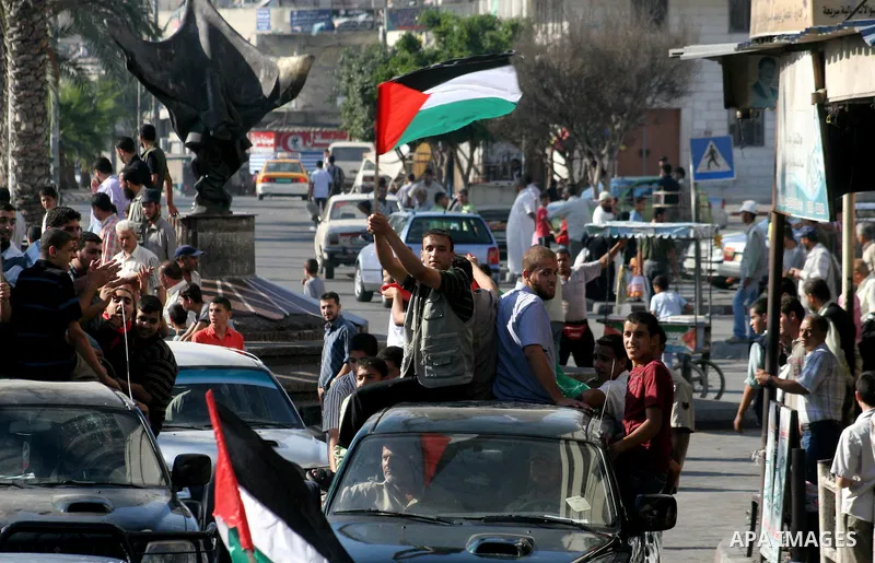 Palestinians celebrate the anticipated release of prisoners currently held in Israel, in Gaza city, Wednesday, Sep 30, 2009. Israel will release 20 Palestinian women from prison this week in exchange for a videotape prov...