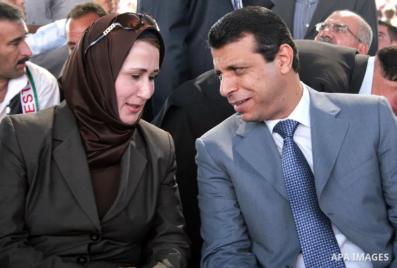 Mohammed Dahlan and Najat Abu Al_Suker from the Fatah Movement leaders attend a festival to honor the new students at the Palestine Polytechnic University in the West Bank town of Hebron, on Oct 13,2009. Photo by Najeh H...