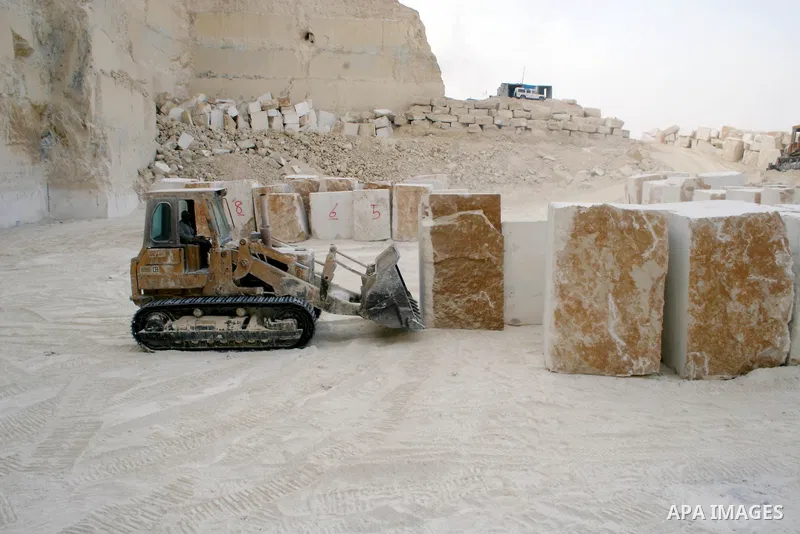 Palestinian labourers work at a quarry in the West Bank village of Taffouh near Hebron October 17, 2009. Stone and marble factories and quarries, located mainly in the West Bank cities of Bethlehem and Hebron, are at the...