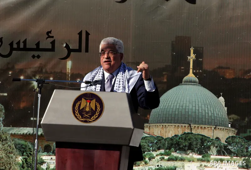 Palestinian president Mahmud Abbas addresses a rally commemorating the fifth anniversary of late Palestinian leader Yasser Arafat's death in the West Bank city of in Ramallah on November 11, 2009.Abbas stood by his deman...