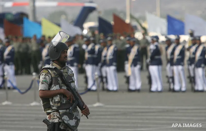 Saudi security forces march during a military parade at a base near Mount Arafat, southeast of the holy city of Mecca, on November 22, 2009. Prince Nayef said the kingdom hopes not to have to "resort to force" to maintai...