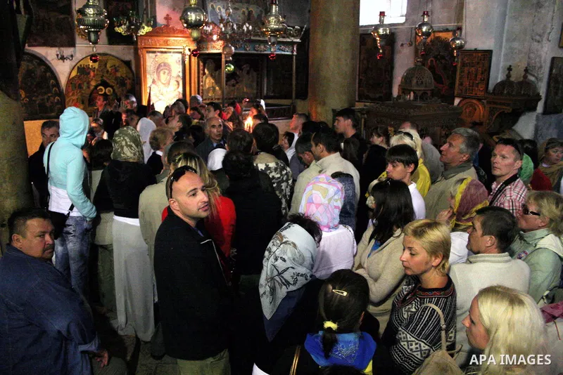 Christian pilgrims visit the Church of the Nativity in the West Bank city of Bethlehem December 11, 2009.The church is built over the grotto where Christians believe the Virgin Mary gave birth to Jesus.Photo by Najeh Has...