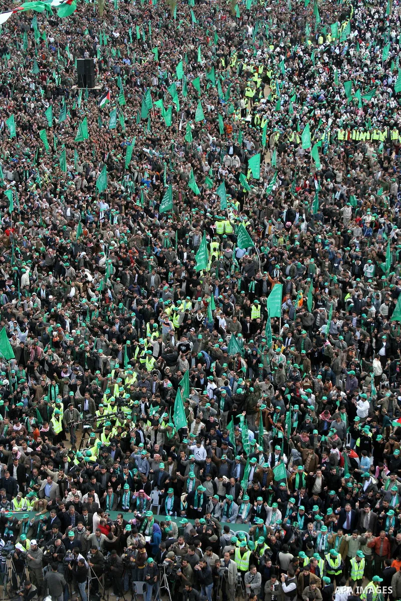 Palestinian Hamas supporters attend a rally in Gaza City on December 14, 2009 marking the 22nd anniversary of the Islamist movement's founding. Hamas Prime Minister Ismail Haniya told tens of thousands of Hamas supporter...