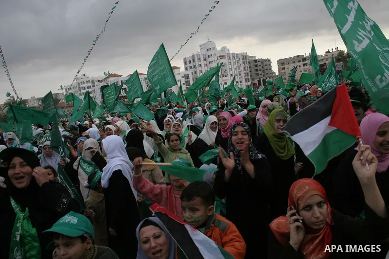 Palestinian Hamas supporters attend a rally in Gaza City on December 14, 2009 marking the 22nd anniversary of the Islamist movement's founding. Hamas Prime Minister Ismail Haniya told tens of thousands of Hamas supporter...