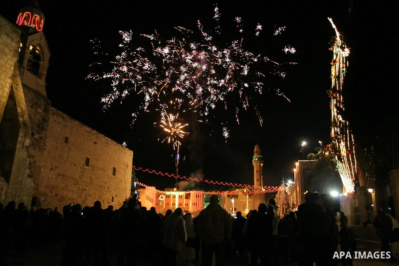 Fireworks explode during a Christmas tree lighting ceremony outside the Church of the Nativity in the West Bank town of Bethlehem December 15, 2009. Christians Pilgrims and tourists are expected to visit Bethlehem, the a...