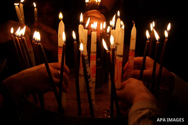 A Christian worshippers during Christmas celebrations in the West Bank city of Bethlehem on December 24, 2009. Thousands of Christians are flocking to the biblical city of Bethlehem, the traditional birthplace of Jesus C...