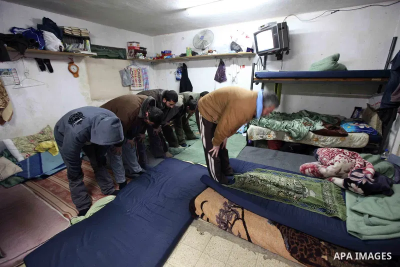 Palestinian Hamas pray in their cell at Hebron Prison in the West Bank city of Hebron, 25 January 2010. Palestinian security forces have stopped torturing Hamas prisoners on 25 January, ending two years of systematically...