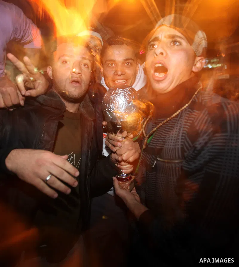Palestinians celebrate in Gaza City after Egypt won the 2010 African Cup of Nations in Angola on January 31, 2010. Egypt entered the record books, beating Ghana 1-0 in the final of the Africa Cup of Nations with supersub...