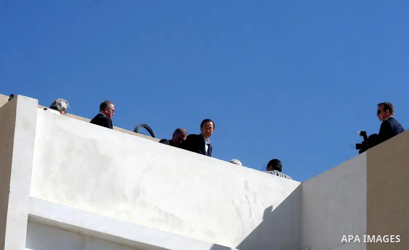 UN Secretary General Ban Ki-moon looking down at new houses built by UN for Palestinian families during his visit to Hai Al Amal area in Khan Yonis refugee camp in the southern Gaza Strip, on 21 March 2010 Photo By Ashra...