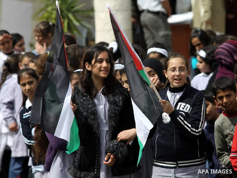 Palestinian schoolchildren shout slogans during a rally in the Land Day, more than 600 children participate in the activity in the northern West Bank village of Salfit Thursday, March 25, 2010. Photo by Nedal Shtieh