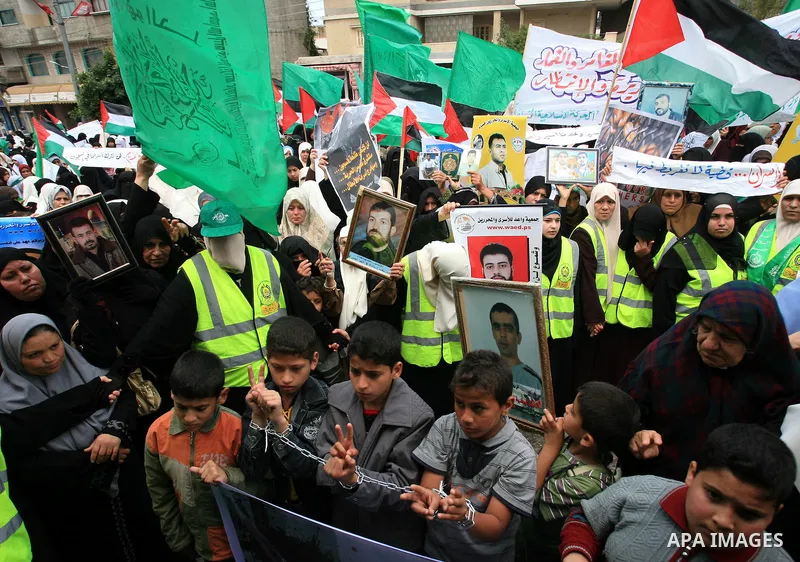 Palestinian Hamas supporters take part in a protest in Gaza City April 22, 2010, calling for the release of Palestinian prisoners from Israeli jails. According to Waed, the Palestinian Prisoners Association, about 7,500...
