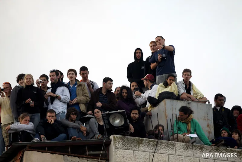 Members of the Samaritan sect take part in the traditional Passover sacrifice ceremony on Mount Gerizim near the West Bank city of Nablus on April 28,2010. The Samaritans, who trace their roots to the biblical Kingdom of...