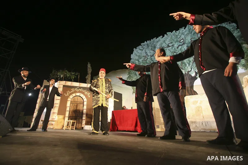 Palestinian actors take part in a Nakba rally in Kafar Kana May 14, 2010. Palestinians will mark "Nakba" (Catastrophe) on May 15 to commemorate the time when hundreds of thousands of Palestinians were expelled or fled fr...