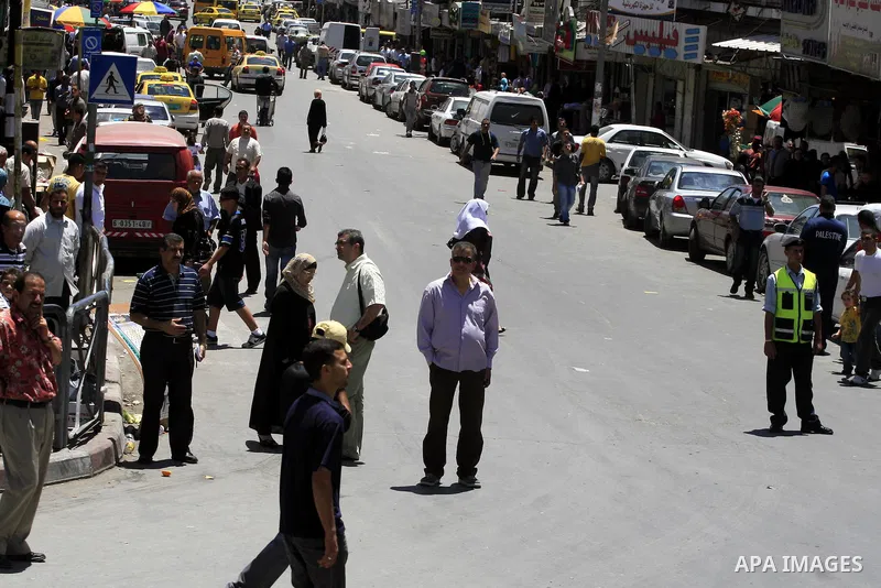Palestinians stop moving during the siren for Nakba day in the West Bank city of Ramallah,Saturday, May 15, 2010.On May 15 Palestinians mark the 62 anniversary of what they call the "Nakba" (catastrophe) or the creation...