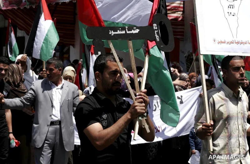 Palestinians attend a Nakba rally in Gaza City May 15, 2010. Palestinians mark "Nakba" (Catastrophe) on May 15 to commemorate the time when hundreds of thousands of Palestinians were expelled or fled from their homes in...