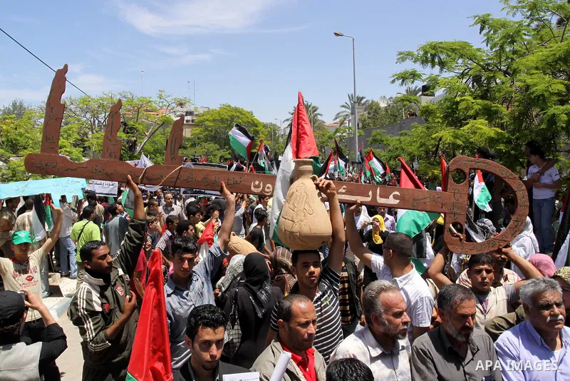 Palestinians attend a Nakba rally in Gaza City May 15, 2010. Palestinians mark "Nakba" (Catastrophe) on May 15 to commemorate the time when hundreds of thousands of Palestinians were expelled or fled from their homes in...
