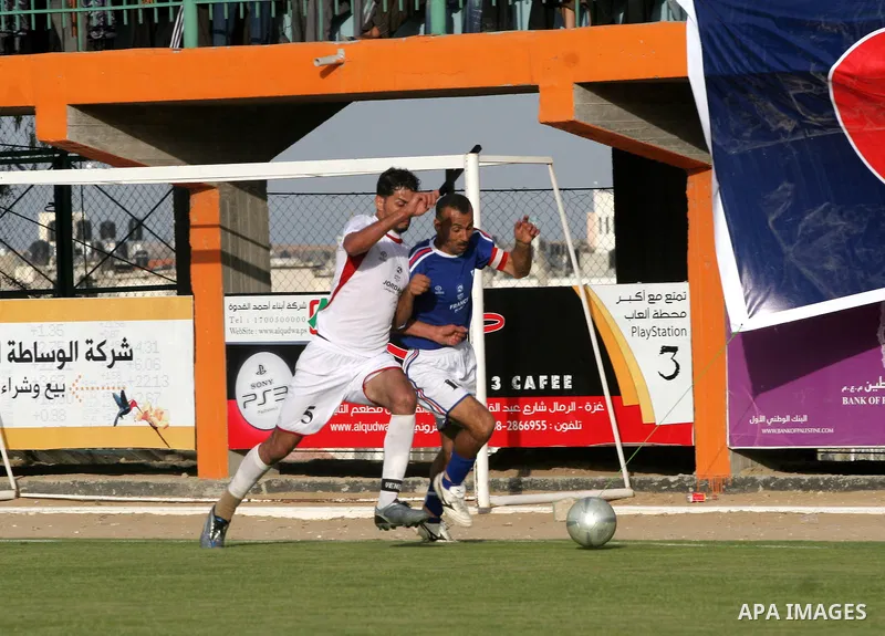 Palestinians play a soccer match between France and Jordan during the final match of Gaza's version of the World Cup in Gaza City on May 15,2010. The Gaza Strip kicked off its own version of the World Cup with teams of P...