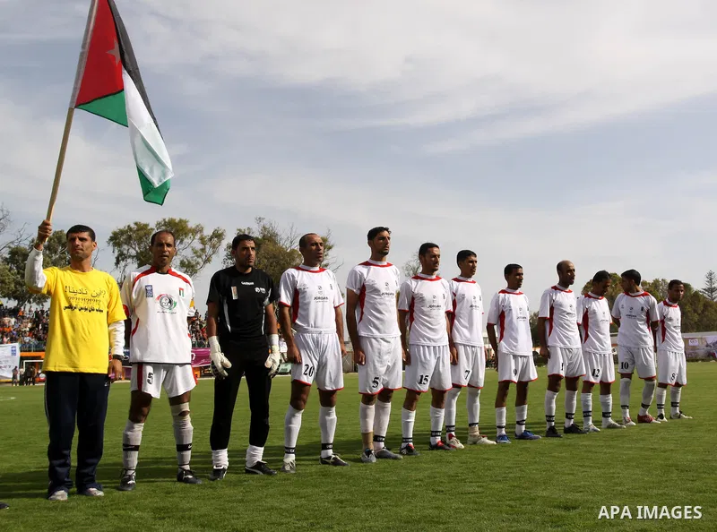 Palestinian players of Jordan take a picture before a soccer match with France during the final match of Gaza's version of the World Cup in Gaza City on May 15,2010. The Gaza Strip kicked off its own version of the World...
