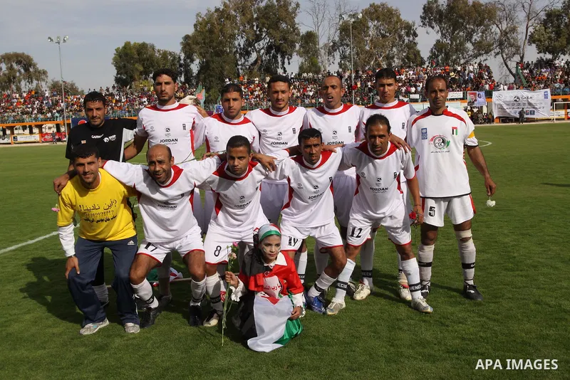 Palestinian players of Jordan take a picture before a soccer match with France during the final match of Gaza's version of the World Cup in Gaza City on May 15,2010. The Gaza Strip kicked off its own version of the World...