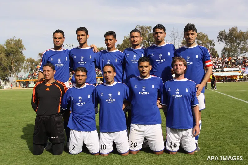 Palestinian players of France take a picture before a soccer match with Jordan during the final match of Gaza's version of the World Cup in Gaza City on May 15,2010. The Gaza Strip kicked off its own version of the World...