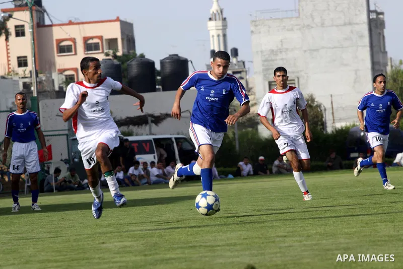 Palestinians play a soccer match between France and Jordan during the final match of Gaza's version of the World Cup in Gaza City on May 15,2010. The Gaza Strip kicked off its own version of the World Cup with teams of P...