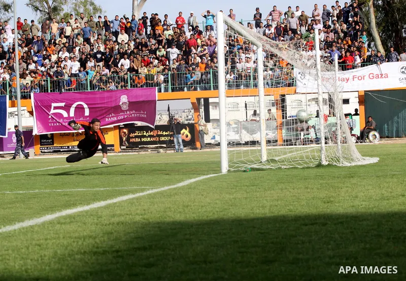 Palestinians play a soccer match between France and Jordan during the final match of Gaza's version of the World Cup in Gaza City on May 15,2010. The Gaza Strip kicked off its own version of the World Cup with teams of P...
