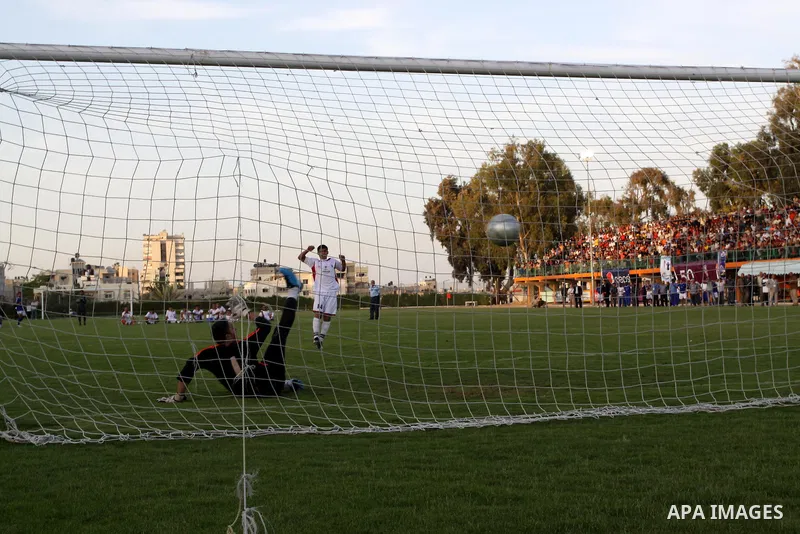 Palestinians play a soccer match between France and Jordan during the final match of Gaza's version of the World Cup in Gaza City on May 15,2010. The Gaza Strip kicked off its own version of the World Cup with teams of P...