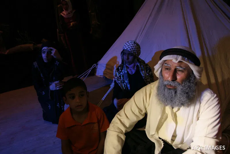 Palestinian actors perform at the Shawwa Theatre in the Nakba Day, in Gaza City on May 17, 2010. Nakba Day marks the anniversary of the "catastrophe" Palestinians say unfolded with the May 1948 creation of the state of I...
