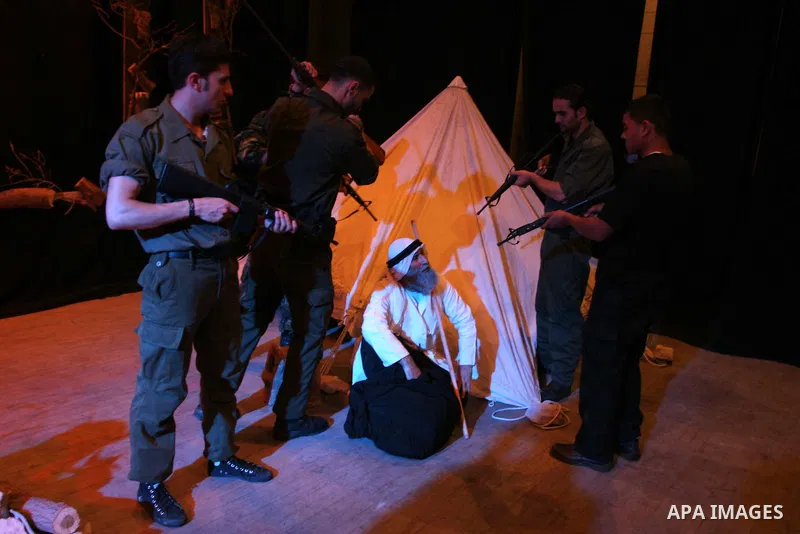 Palestinian actors perform at the Shawwa Theatre in the Nakba Day, in Gaza City on May 17, 2010. Nakba Day marks the anniversary of the "catastrophe" Palestinians say unfolded with the May 1948 creation of the state of I...