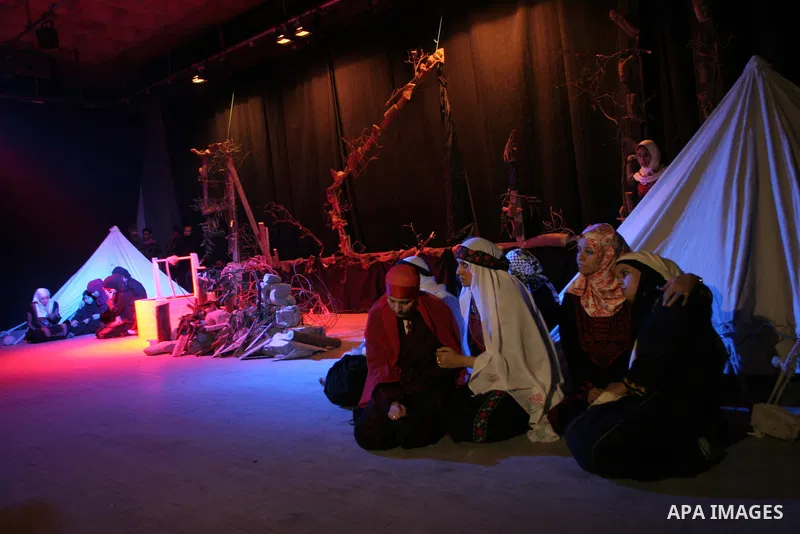 Palestinian actors perform at the Shawwa Theatre in the Nakba Day, in Gaza City on May 17, 2010. Nakba Day marks the anniversary of the "catastrophe" Palestinians say unfolded with the May 1948 creation of the state of I...