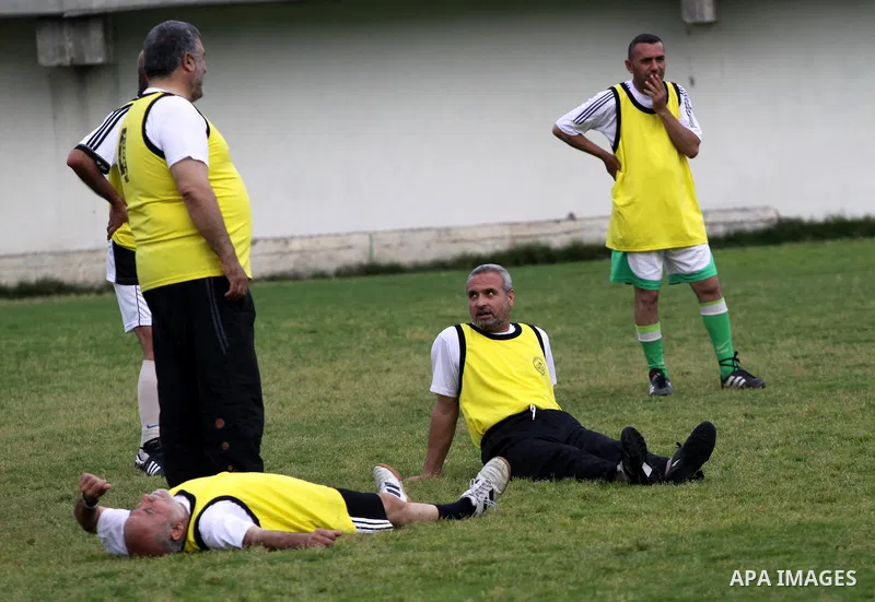 Palestinian ministers, Parliament members and released prisoners take part in a football match in Gaza City on May 18,2010. Photo by Mohammed Asad