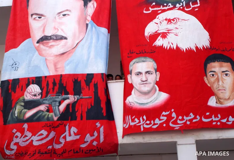 Palestinian supporters of the Popular Front for the Liberation of Palestine take part in a rally calling for release the prisoners from Israeli jails in Beit Fourik village near the West Bank city of Nablus on May 21, 20...