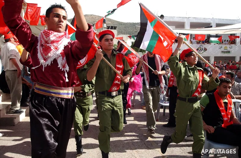 Palestinian supporters of the Popular Front for the Liberation of Palestine take part in a rally calling for release the prisoners from Israeli jails in Beit Fourik village near the West Bank city of Nablus on May 21, 20...