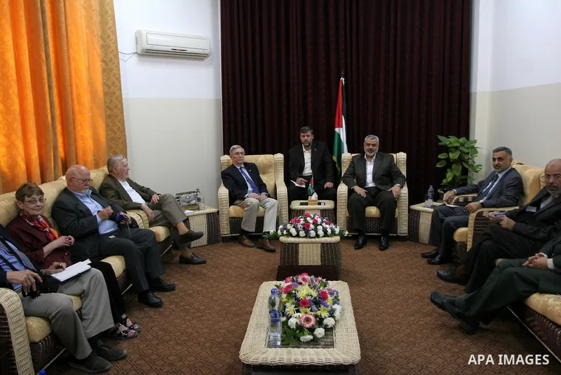 Palestinian Prime Minister in the Gaza Strip, Ismail Haniya meets with a US delegation headed by David Newton, a retired US ambassador, at his office in Gaza City on May 22, 2010. Photo by Ashraf Amra