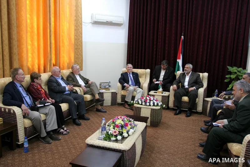 Palestinian Prime Minister in the Gaza Strip, Ismail Haniya meets with a US delegation headed by David Newton, a retired US ambassador, at his office in Gaza City on May 22, 2010. Photo by Ashraf Amra