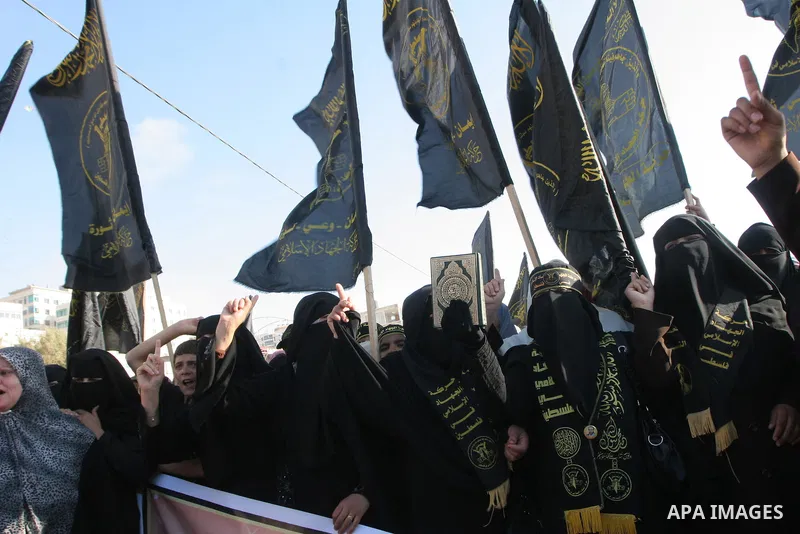 Palestinian Islamic Jihad supporters take part in anti-Israeli protest at the port of Gaza City on May 31, 2010. At least 10 activists were killed in an Israeli naval takeover on Monday of a Gaza-bound aid convoy, an Isr...