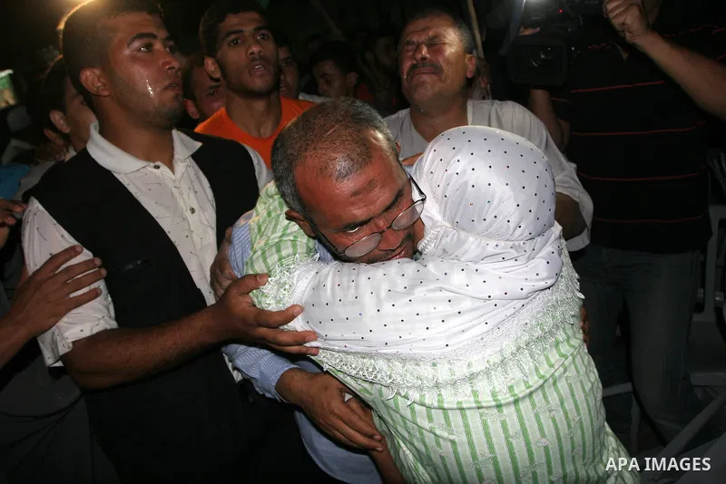 Palestinian Ahmed Al-Dahshan, who was detained while aboard a Gaza-bound ship, is welcomed by relatives upon his arrival to Gaza City June 2, 2010. In a televised address after world outrage erupted over nine deaths in M...
