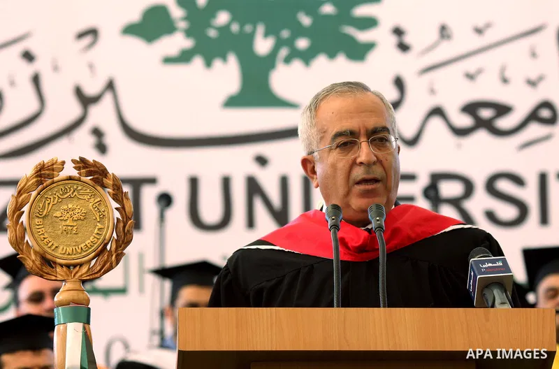 Palestinian Prime Minister Salam Fayyad attends the 35th Graduation Ceremony for students of Birzeit University near the West Bank city of Ramallah on June 5, 2010. Photo by Eyad Jadallah