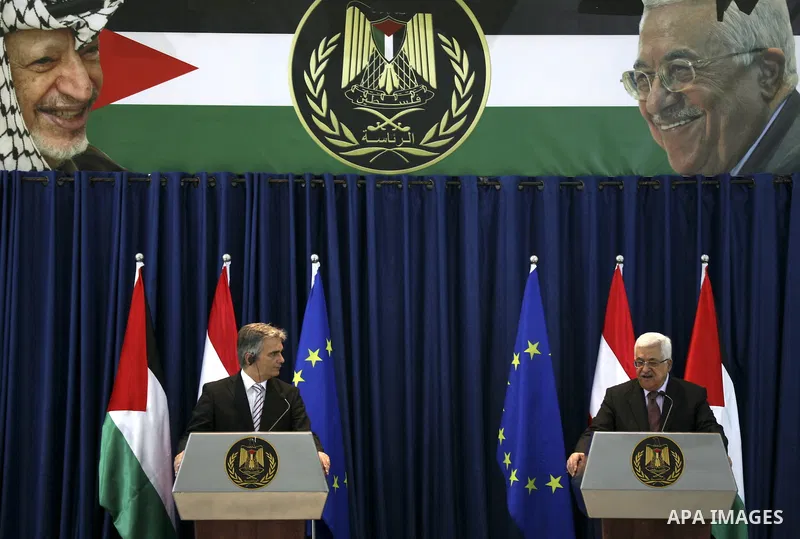 Palestinian President Mahmoud Abbas and Austrian Chancellor Werner Faymann hold a joint news conference in the West Bank city of Ramallah on June 24, 2010. Photo by Eyad Jadallah