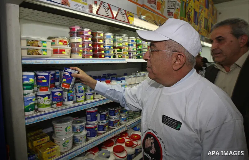 Palestinian Prime Minister Salam Fayyad during the launching of the "store to store" campaign to clean the Palestinian shops from settlements products in a store in the West Bank city of Ramallah on June 28,2010. Photo b...