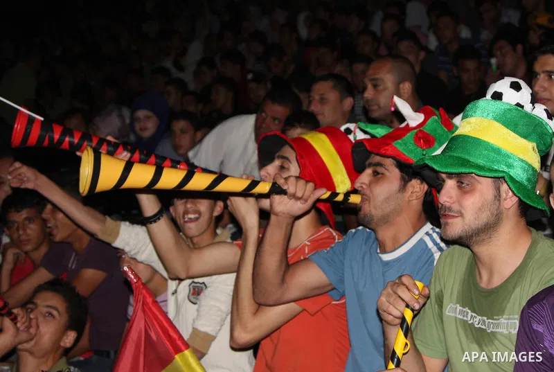Palestinian fans of Spain celebrates during the semifinal match between Germany and Spain in the West Bank city of Nablus on July 7,2010, the Spanish national soccer team defeated Germany in their South Africa soccer FIF...