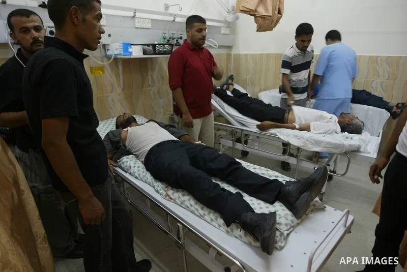 An injured Palestinians lie in beds in the hospital following and Israeli strike on July 21, 2010 in Beit Hanun, near the border with Israel in the northern Gaza Strip, in which two persons were killed and 10 others were...