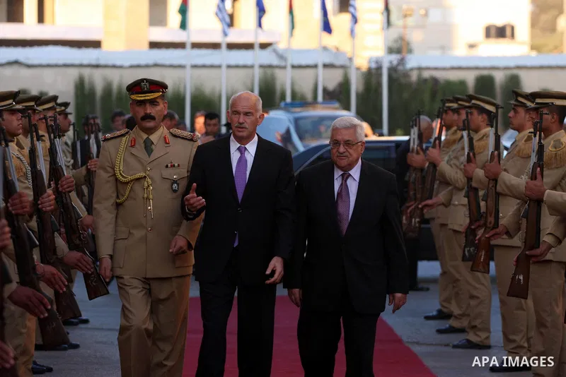 Palestinian President Mahmoud Abbas during a meeting with the Greek Prime Minister, George Papandreou in the West Bank city of Ramallah on July 22,2010. Photo by Eyad Jadallah