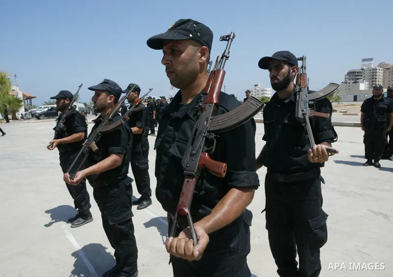 Palestinian security forces perform during an exercise at their graduation ceremony in Gaza City, Monday, July 26, 2010. Photo by Ashraf Amra