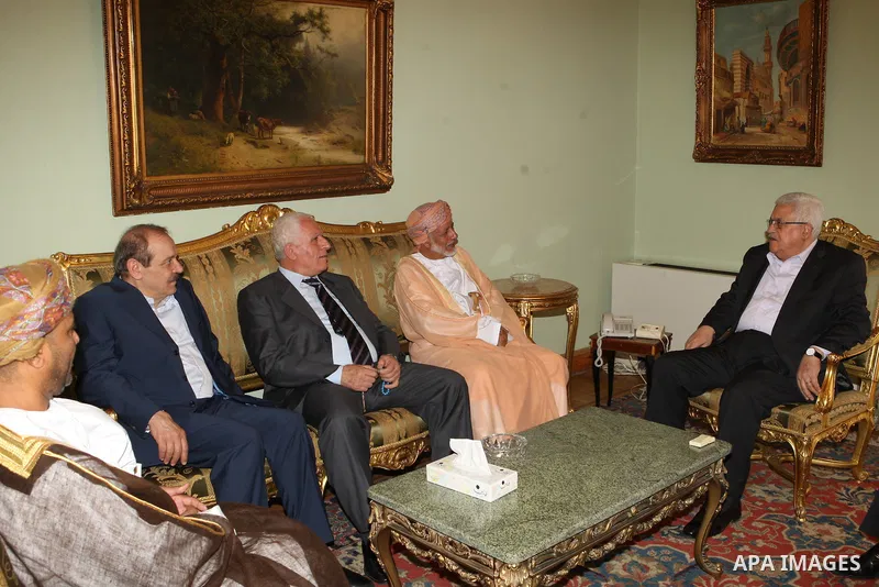 Palestinian President Mahmoud Abbas (Abu Mazen) during a meeting with Omani Minister of State for Foreign Affairs, Yousef bin Alawi bin Abdullah in the Egyptian capital of Cairo on July 28,2010. Photo by Thaer Ganaim
