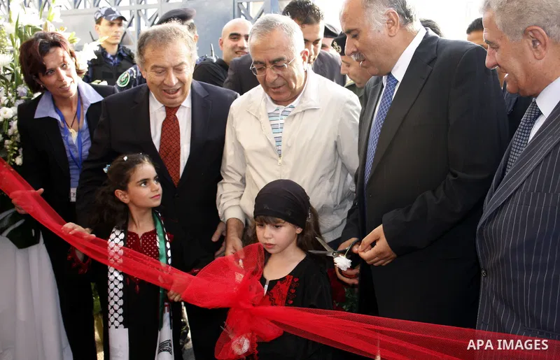 Palestinian Prime Minister Salam Fayyad attends the opening celebration of the closed Hebron sport hall in the West Bank city of Hebron on July 30,2010. Photo by Mamoun Wazwaz