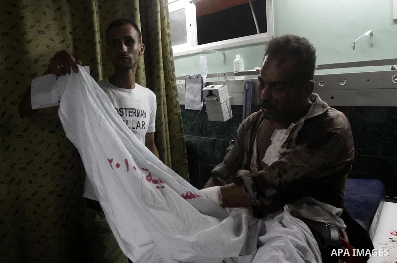 A wounded Palestinian man receives treatment at al-Shifa hospital in Gaza City, July 31, 2010. Israeli war jets struck on Friday night three targets in western Gaza city and in central and southern Gaza Strip, wounding a...