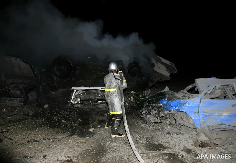 Palestinian fire fighter works on the scene following Israeli air-strike at a military site for Hamas in Gaza City, July 31, 2010. Israeli war jets struck on Friday night three targets in Gaza Strip, wounding at least ni...