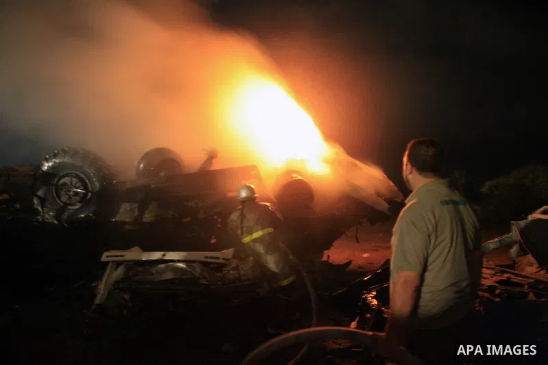 Palestinian fire fighter works on the scene following Israeli air-strike at a military site for Hamas in Gaza City, July 31, 2010. Israeli war jets struck on Friday night three targets in Gaza Strip, wounding at least ni...