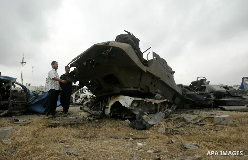 Member of Hamas' security forces surveys the damage after Israeli air strikes at a training camp in Gaza City July 31, 2010. Israel carried out air strikes on targets in the Gaza Strip on Friday after a rocket fired from...